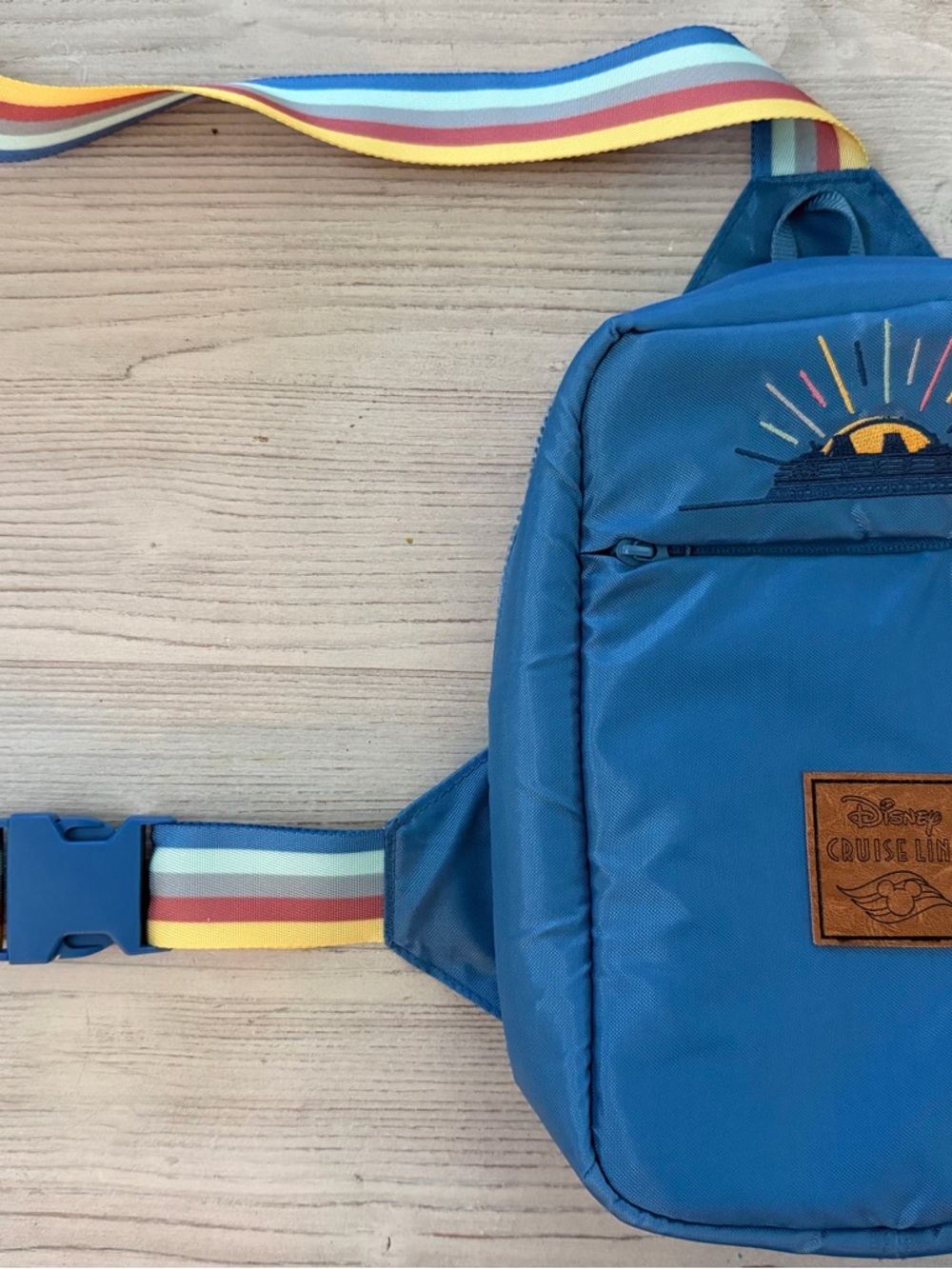 Disney Cruise Line Blue Crossbody Sling Bag with Rainbow Strap